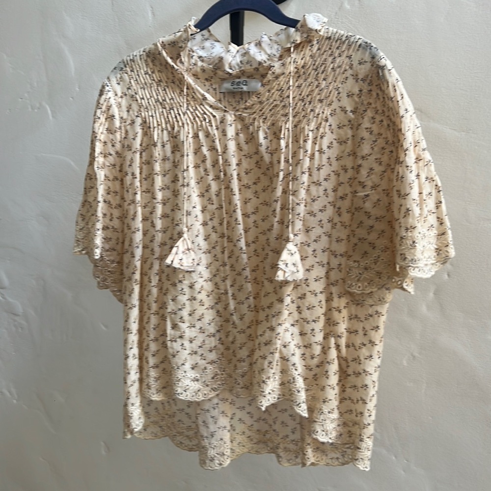 Yellow floral blouse with tassels
